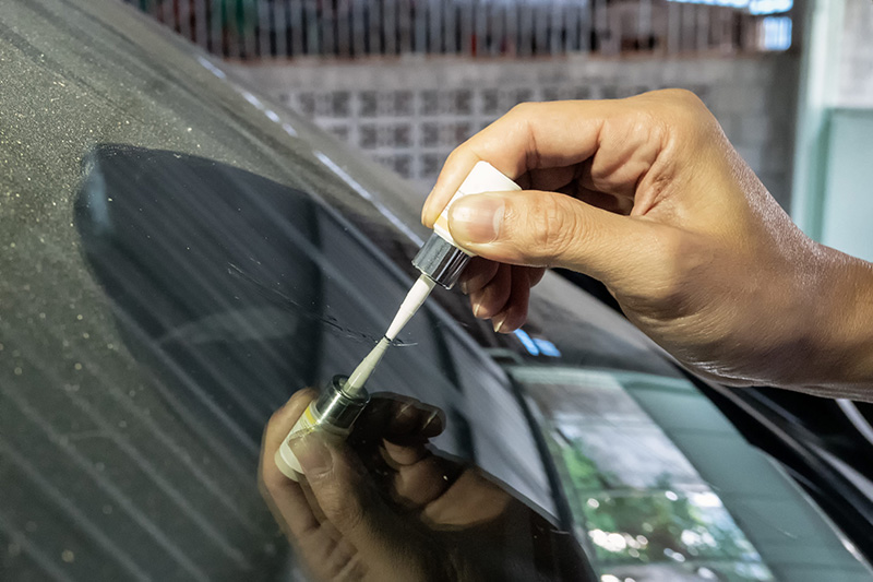 Repairing Windshield at Auto Glass Repair OC